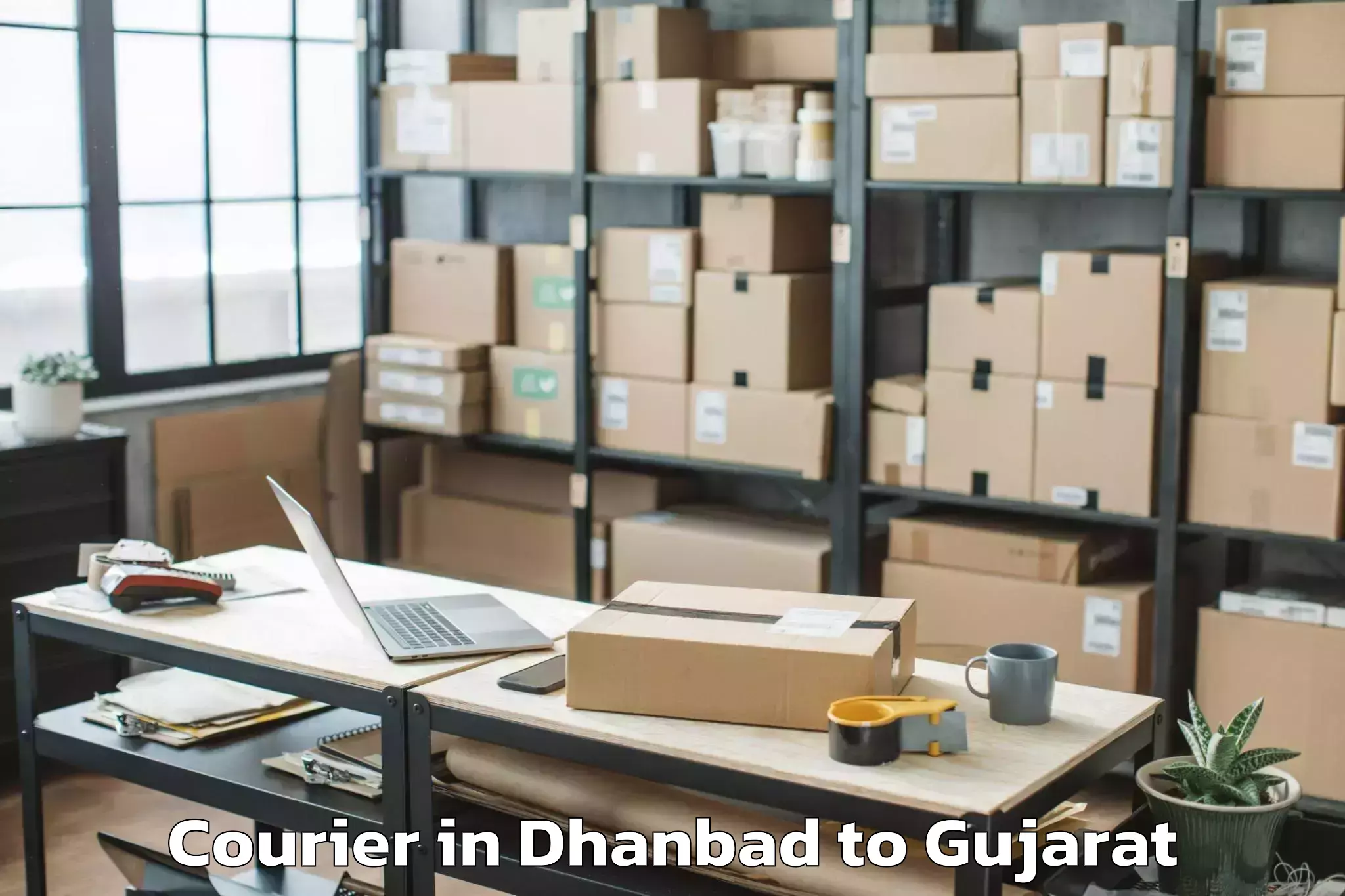 Easy Dhanbad to Anjar Courier Booking